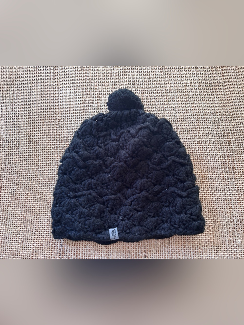 The North Face Black Cable Knit Hat with Pompom & Fleece Lining. One Size